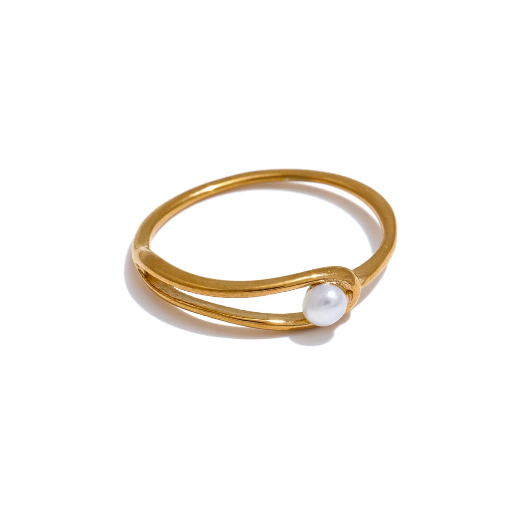Thin ring with chain and natural pearls 